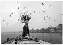 Art Prints of Naga Sadhu posing on boat at varanasi